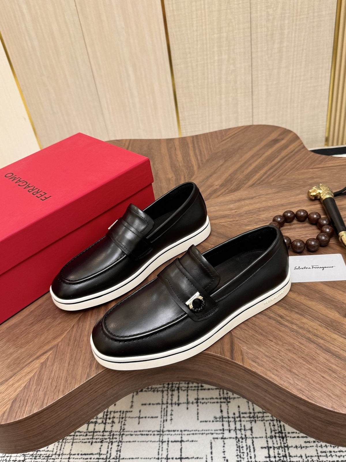 Salvatore Ferragamo Black Loafers with White Soles